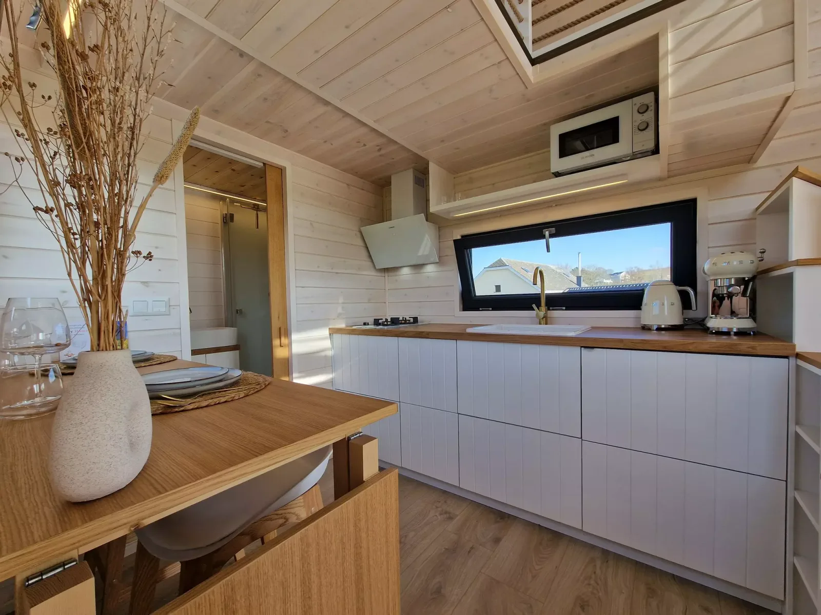 Chambre avec lit queen size de Tiny Cosy